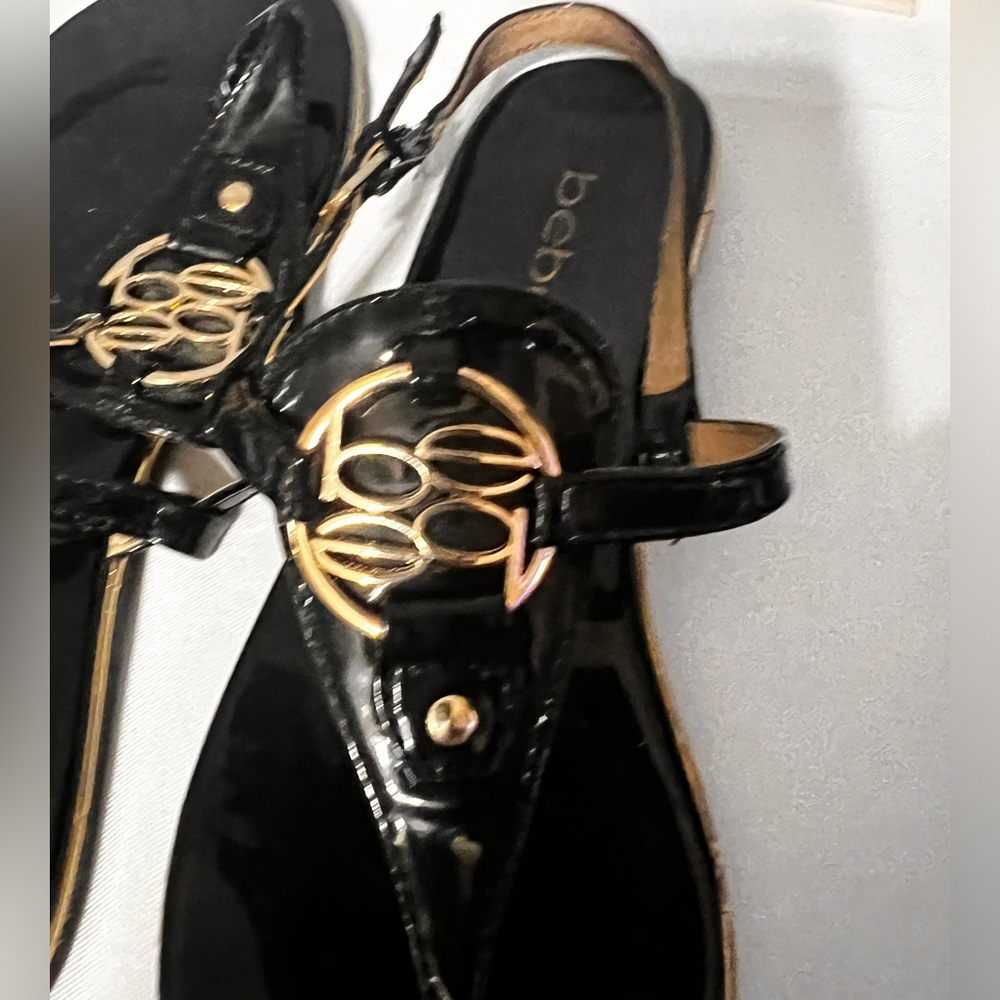 Used Bebe Roman style sandals.